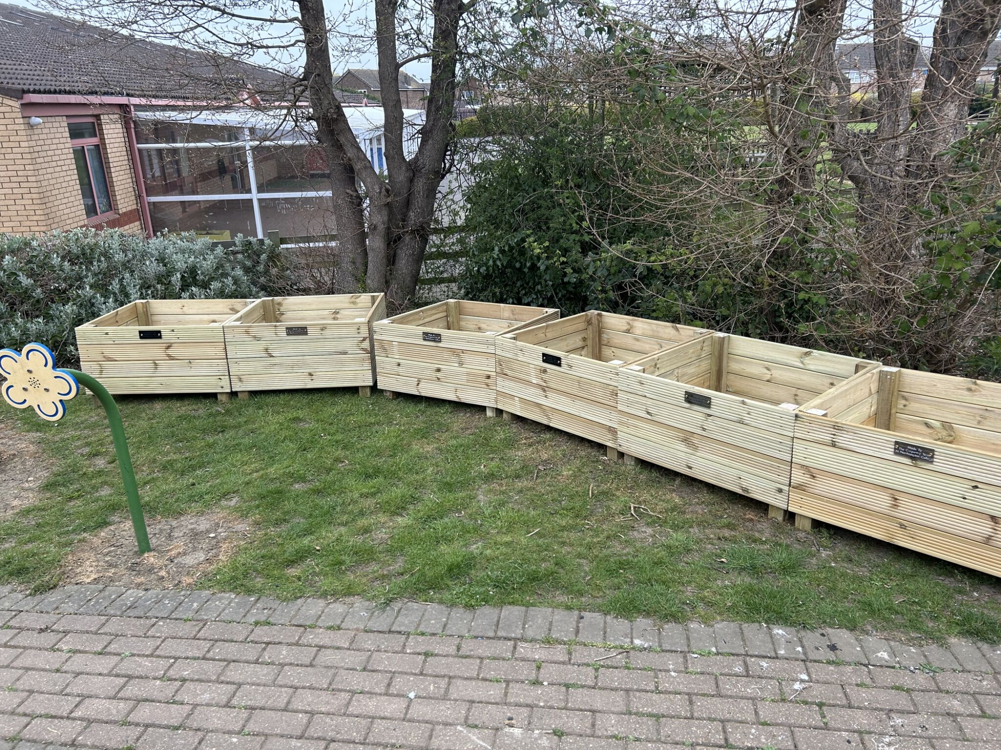New planters in situ in the playground