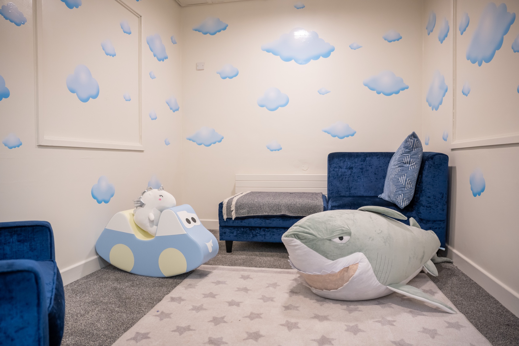 New breakout room with cloud theme and giant whale soft toy